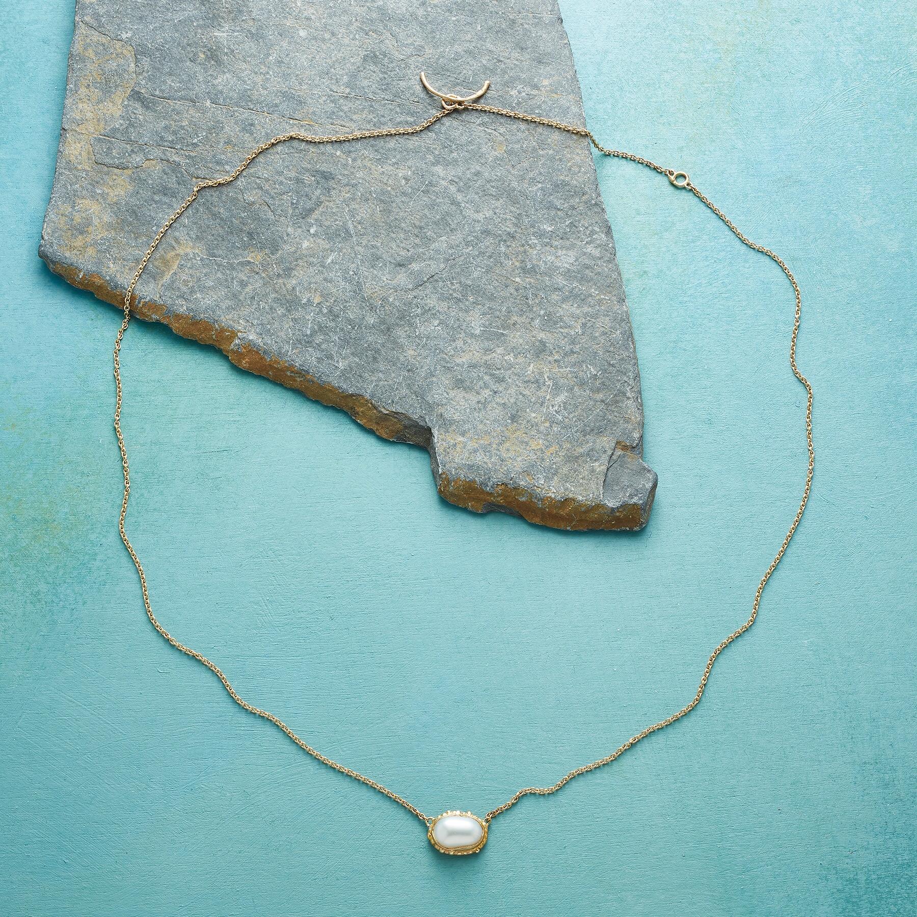 Portrait In Pearl Necklace